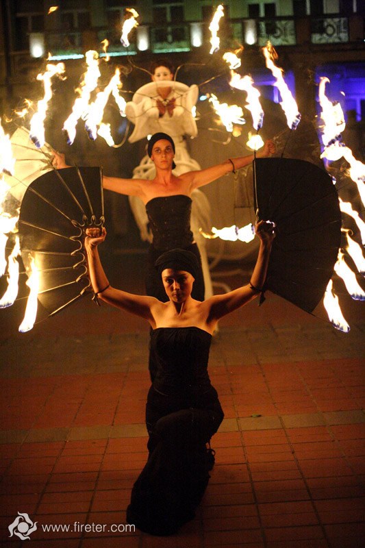 performers spin fire